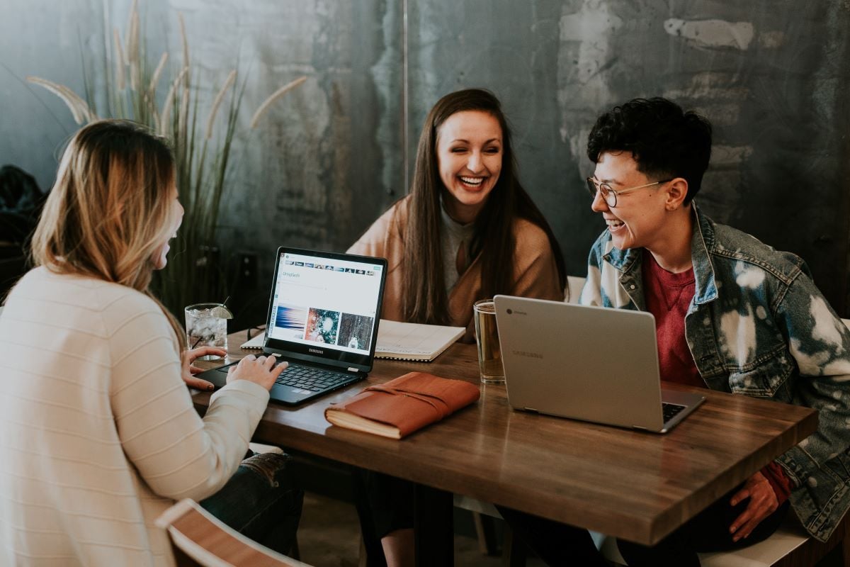 Brand Asset   Imagery   Office   Smiling colleagues with laptops  